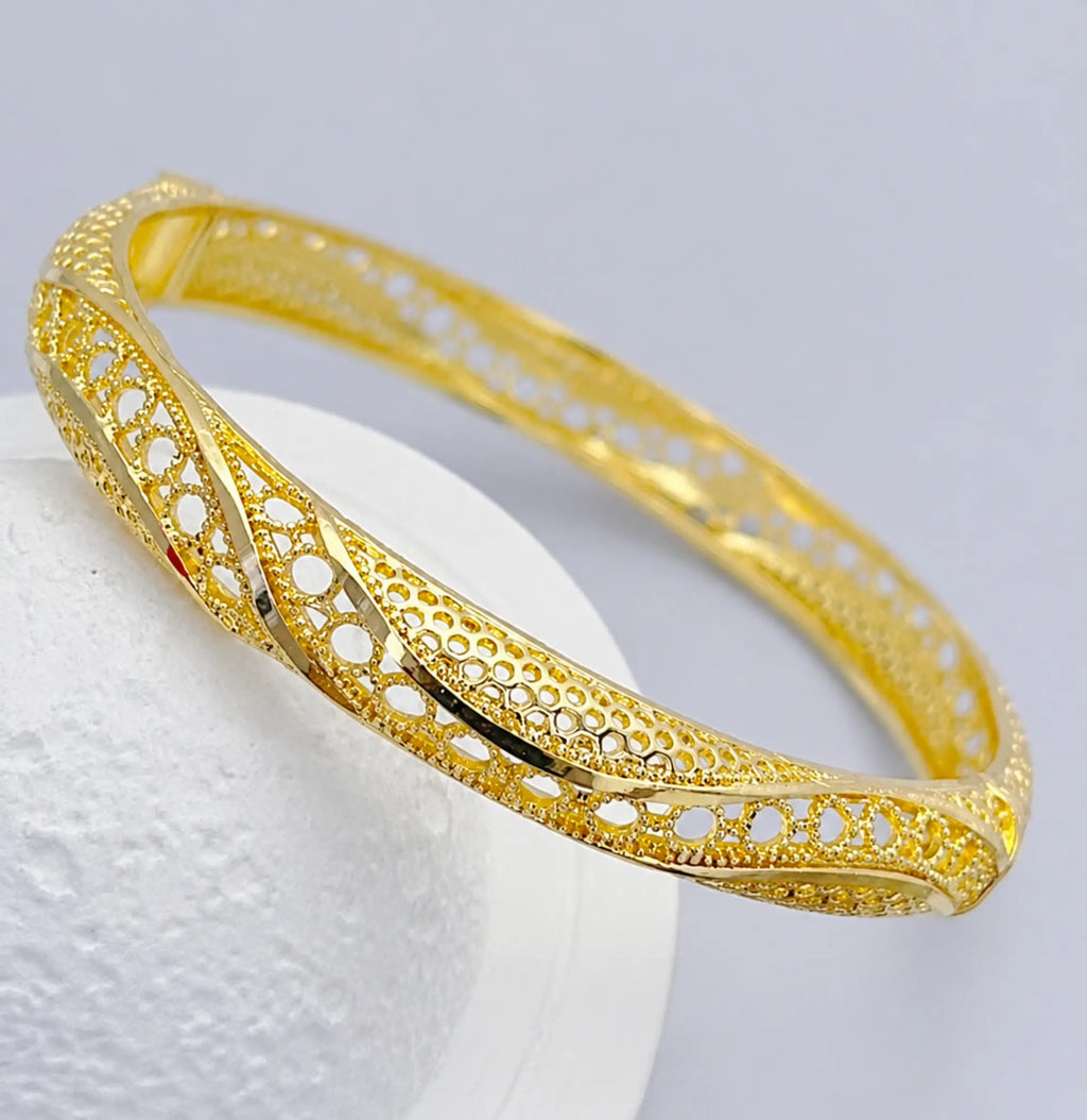 Filigree gold finish bangle bracelet